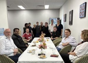 VTS Certificate III Hospitality students and trainers with guests at Campus Walk Through Morning Tea event