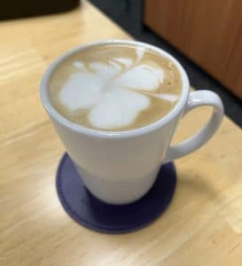 Four leaf clover latte art coffee made by VTS Certificate III Hospitality student